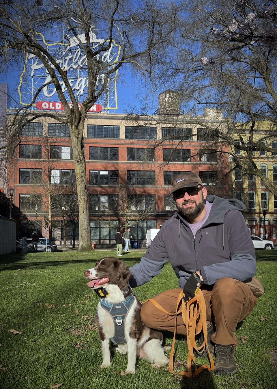 Jake in front of the Portland Oregon sign